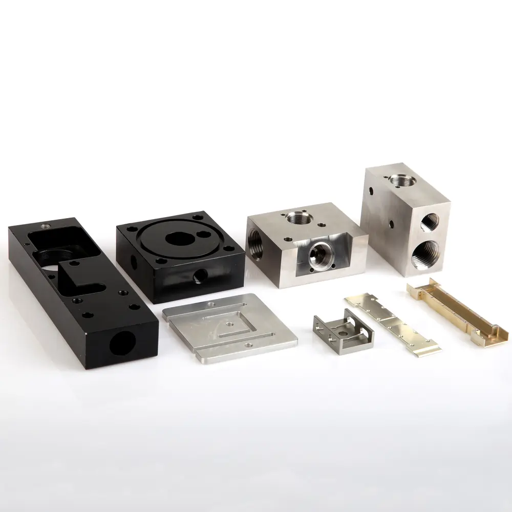 Assorted precision metal parts produced by 4 axis CNC milling services at Meco