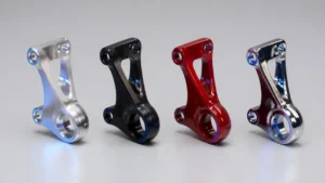 Die cast aluminum parts shown with four different surface finishes side by side